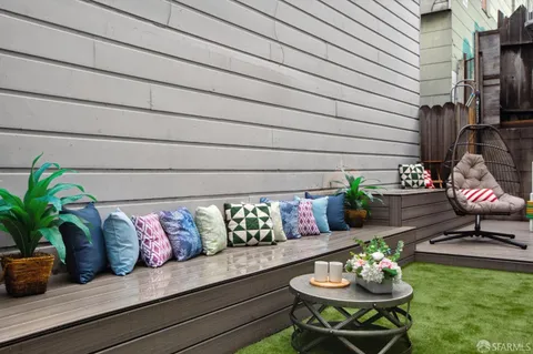 a view of stairs yard from a balcony