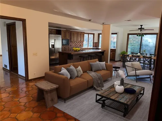 a living room with furniture and a table