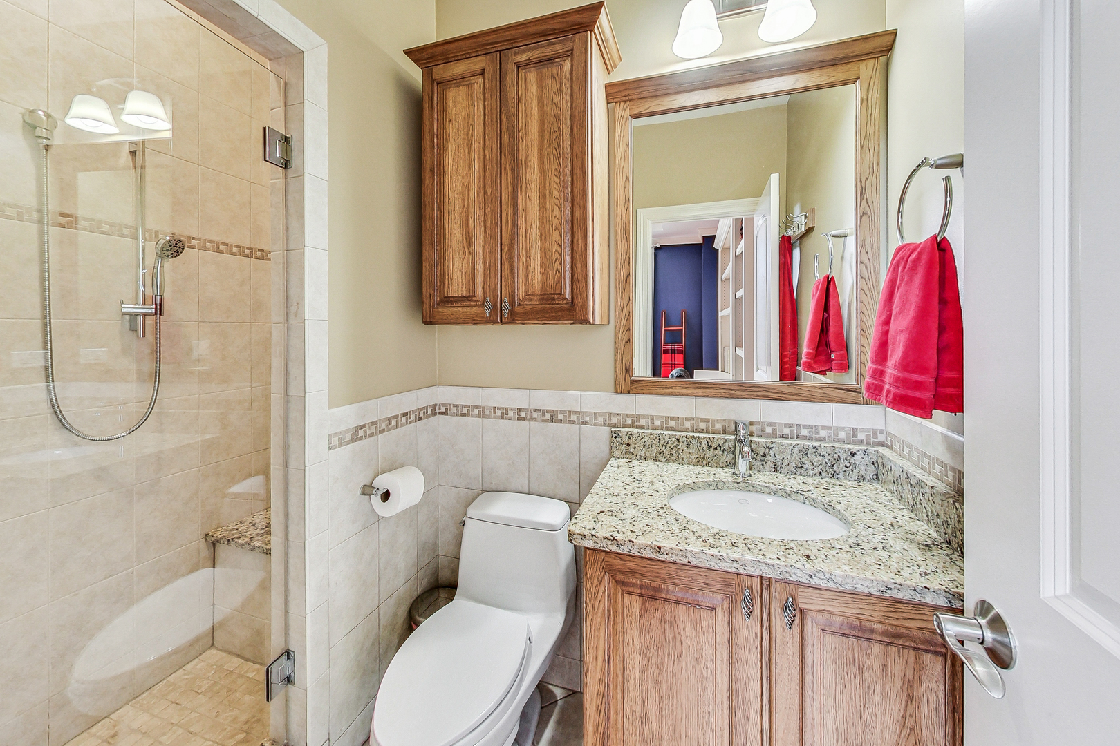 428 South Clifton Avenue Park Ridge, IL 60068 - Photo 23 of 43 a bathroom with a granite countertop sink and a mirror