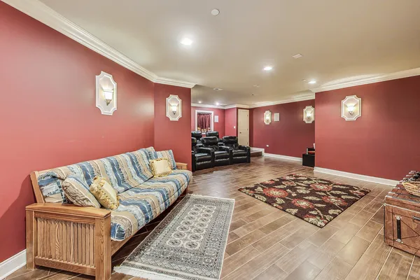 a room with furniture and a wooden floor