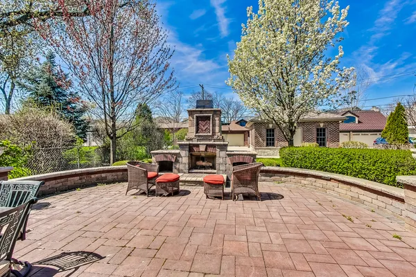 a view of a chairs and tables in the patio