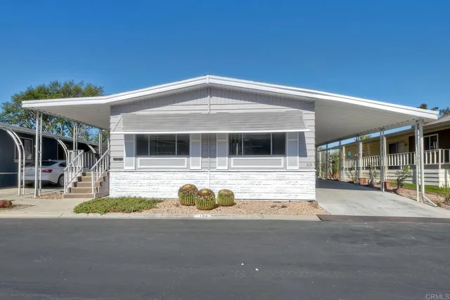 a view of a house with a swimming pool