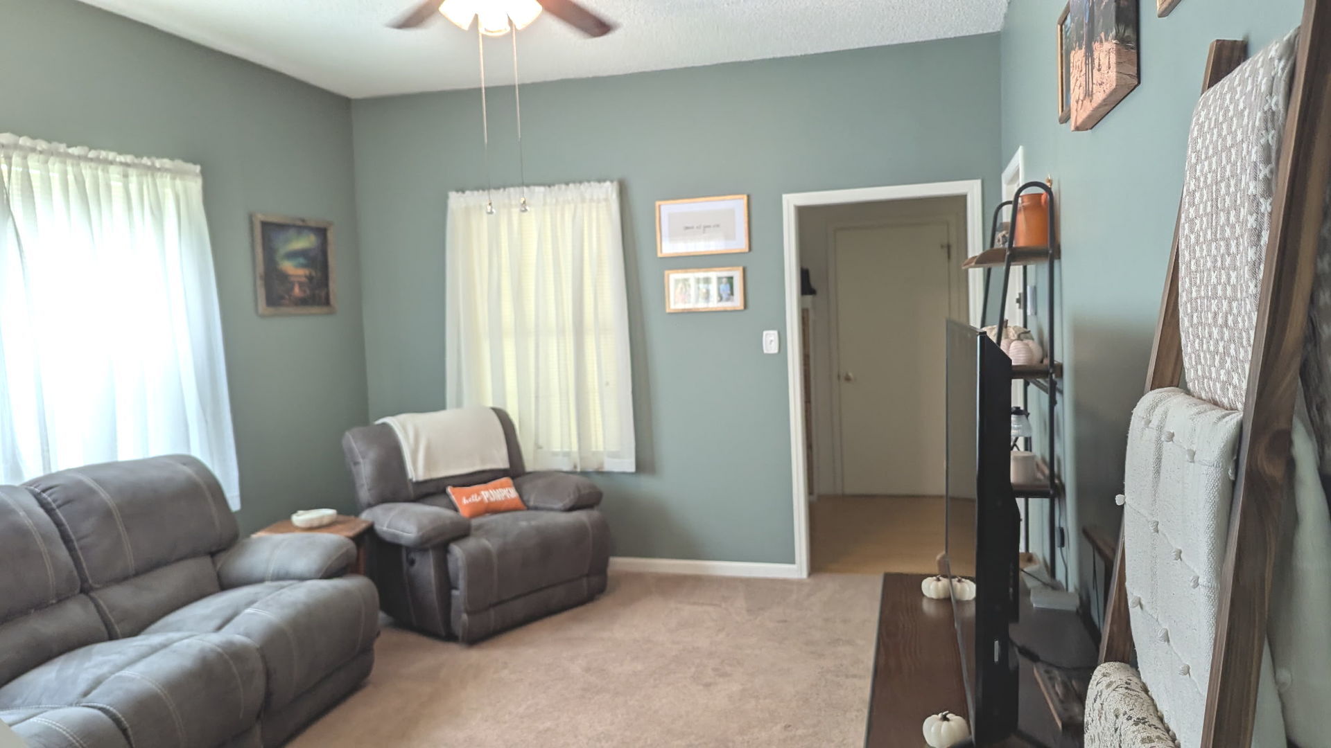 817 Chestnut Avenue Dixon, IL 61021 - Photo 13 of 31 a living room with furniture and a chandelier