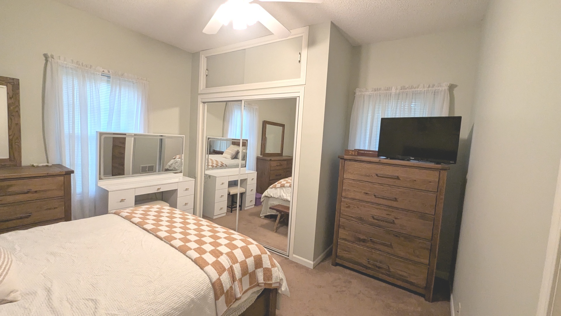 817 Chestnut Avenue Dixon, IL 61021 - Photo 18 of 31 a bedroom with a bed and a flat screen tv
