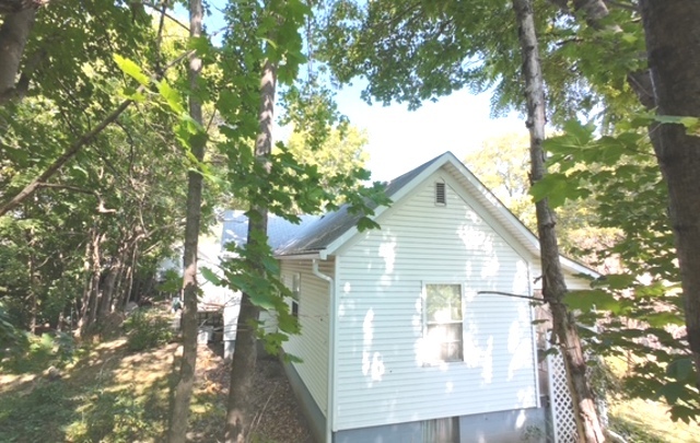 817 Chestnut Avenue Dixon, IL 61021 - Photo 4 of 31 a view of a house with a yard