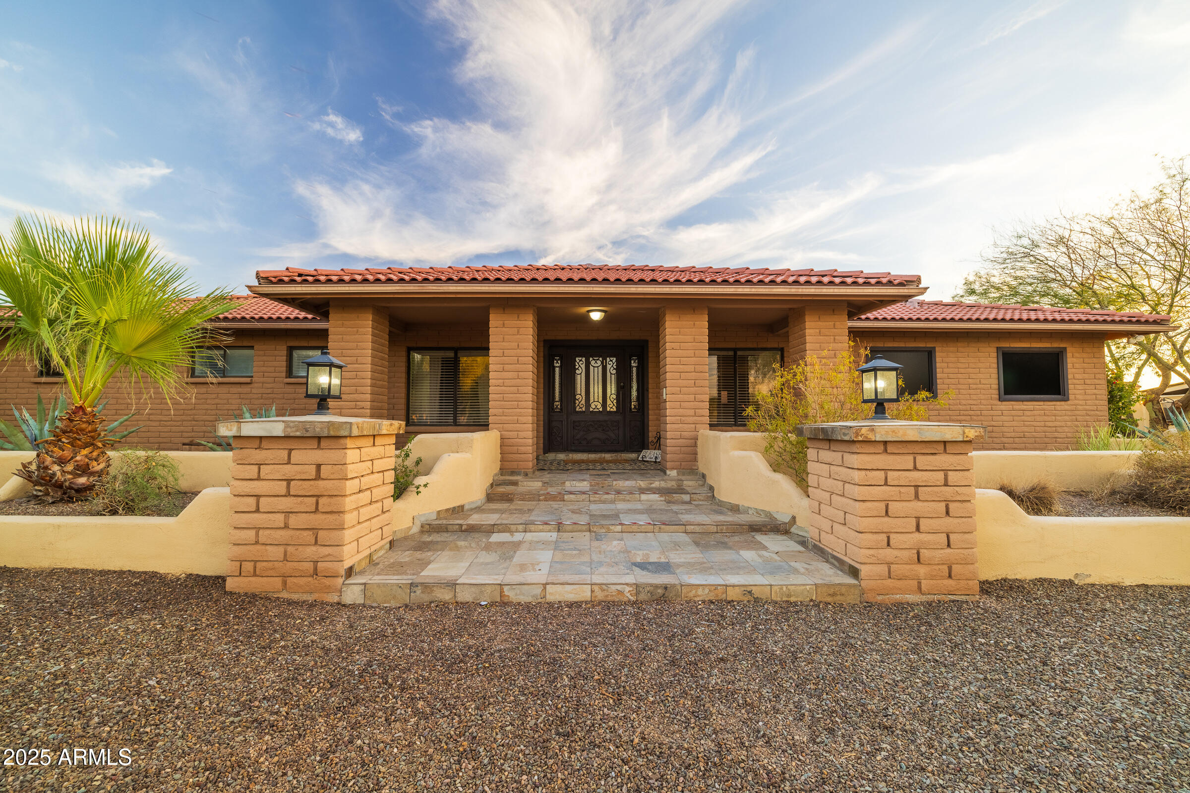 6835 East Peak View Road Scottsdale, AZ 85266 - Photo 79 of 107 front view of a house with a yard