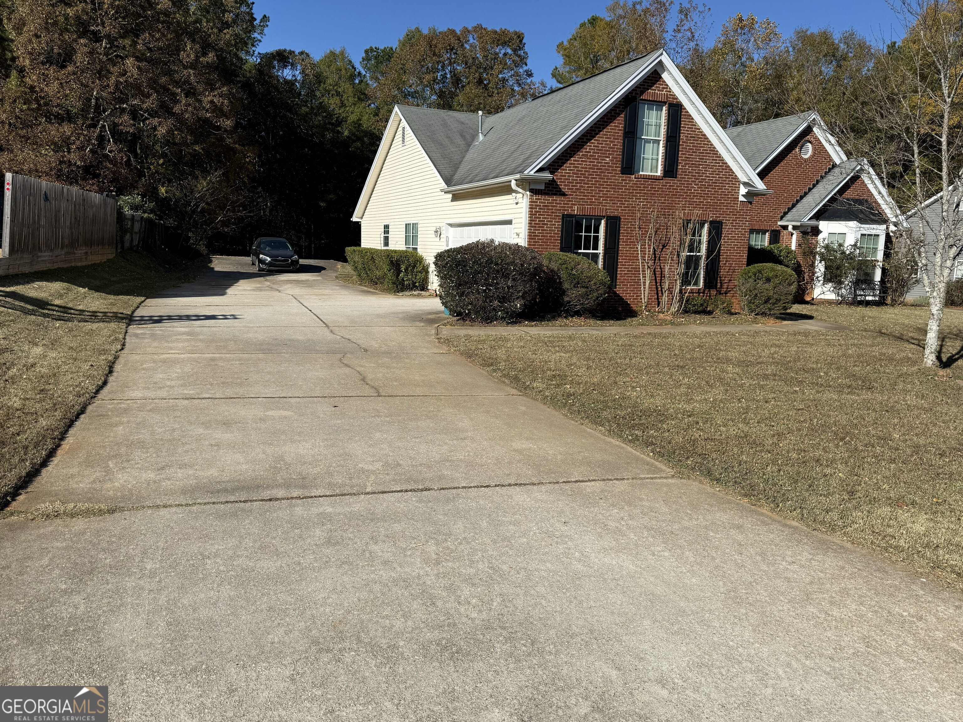 252 Sandstone Drive Hampton, GA 30228 - Photo 2 of 17 a view of a house with a yard