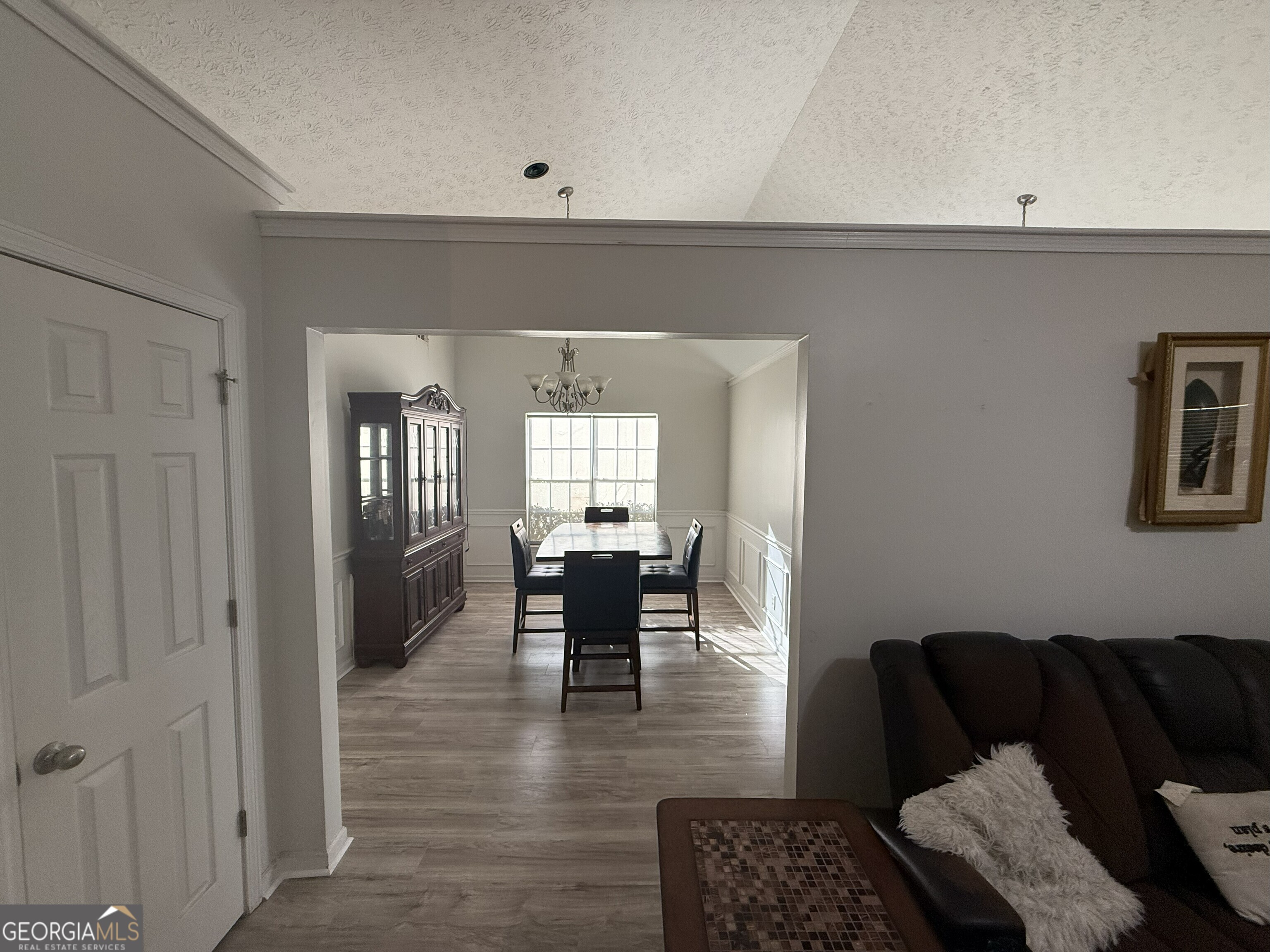 252 Sandstone Drive Hampton, GA 30228 - Photo 6 of 17 a living room with furniture and wooden floor