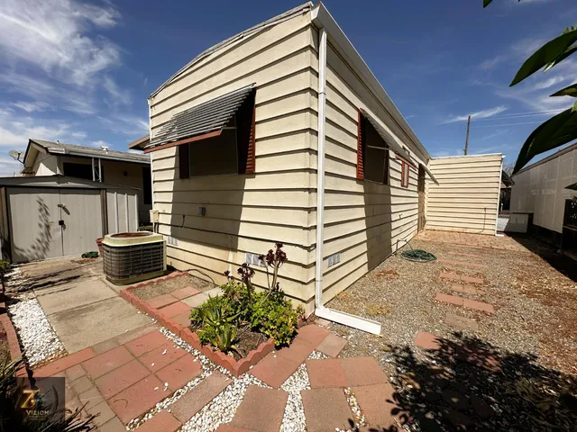 a view of a house with a patio