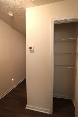 a view of a house with backyard and deck