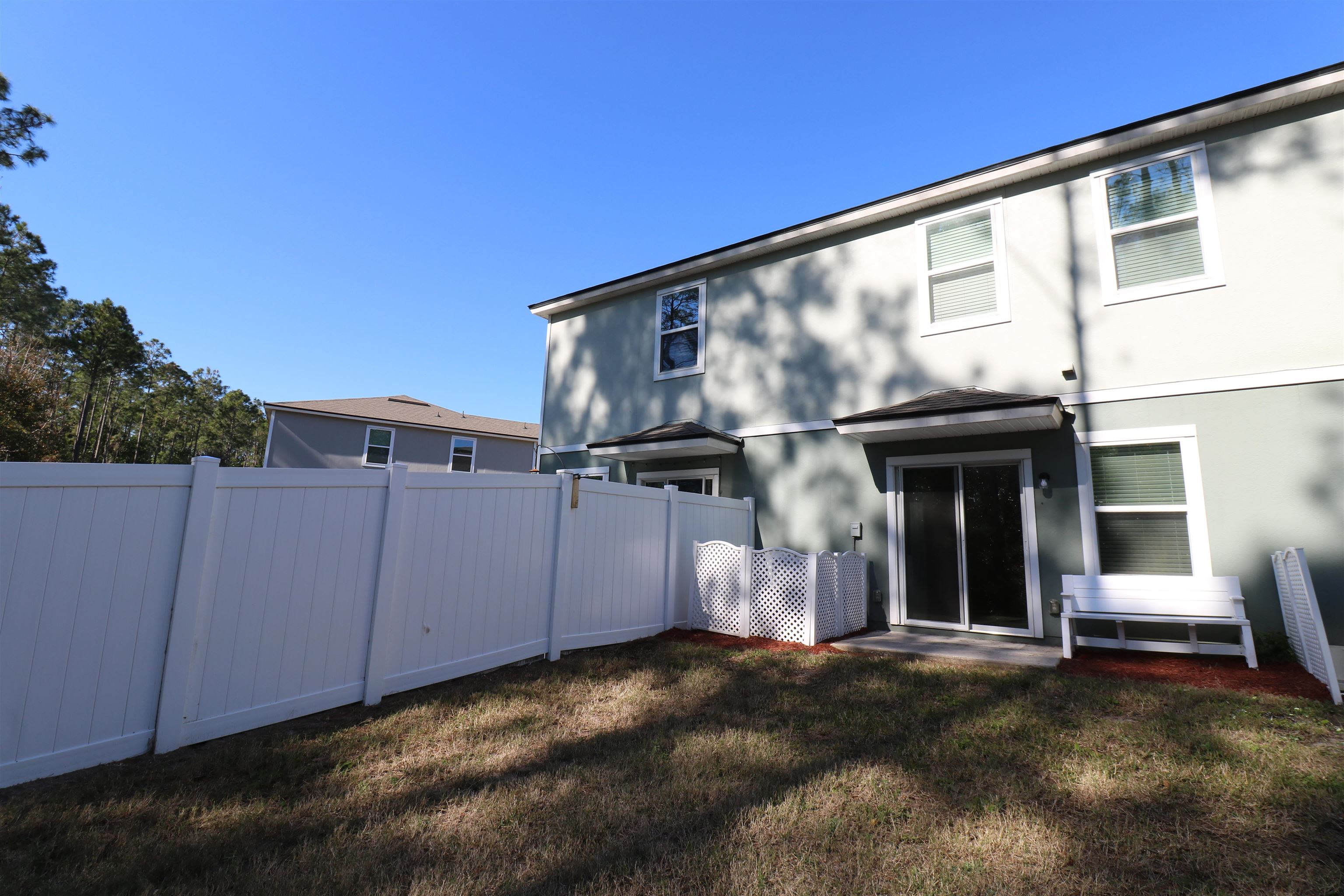 638 Servia Drive St. Johns, FL 32259 - Photo 19 of 27 a view of a house with backyard and deck