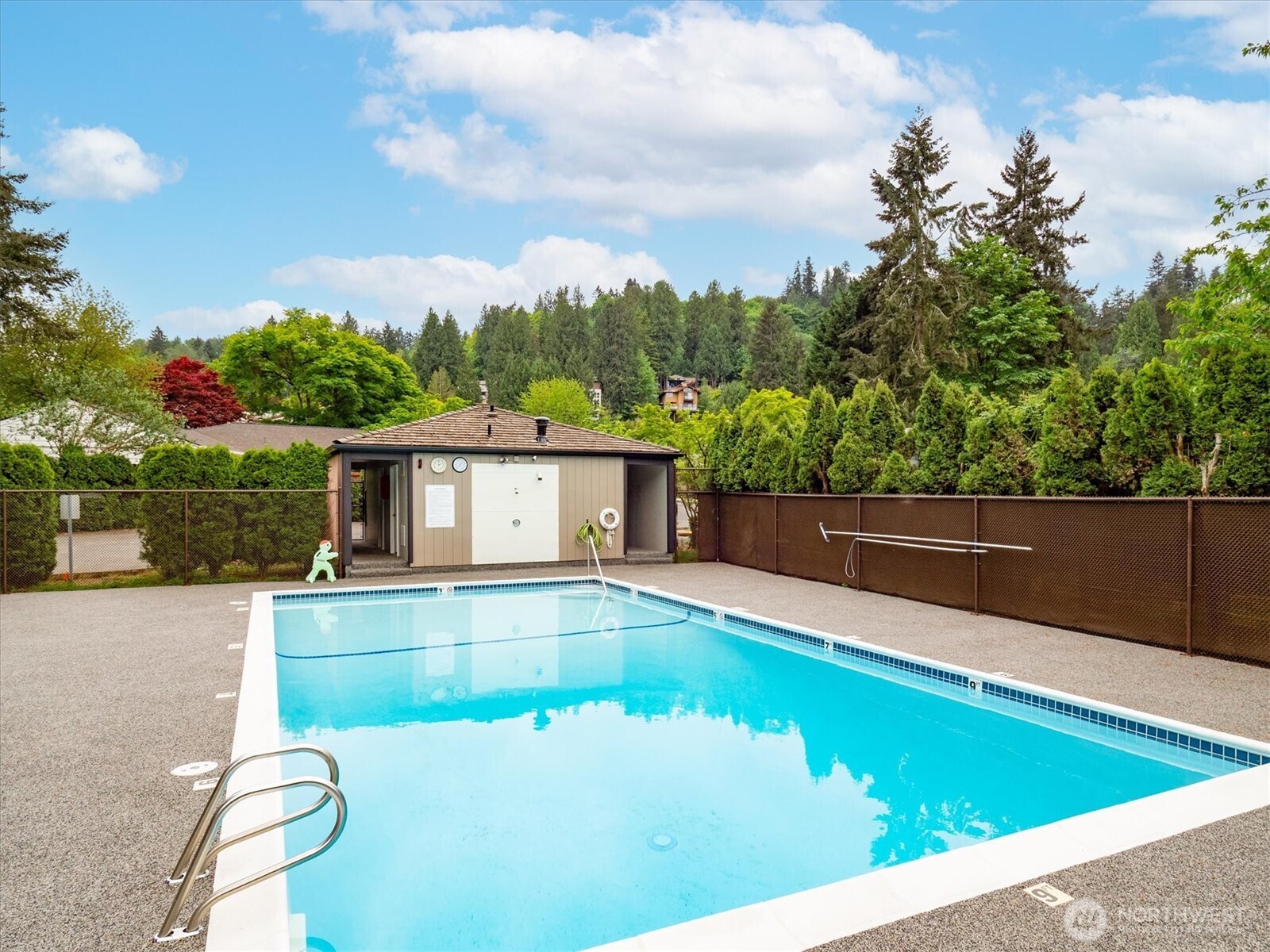 9503 Odin Way Bothell, WA 98011 - Photo 38 of 39 a view of a swimming pool with a patio