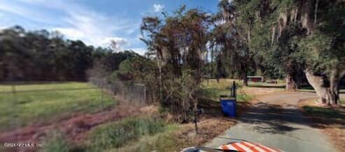 0 New Ogilvie Road Callahan, FL 32011 - Photo 4 of 9 a view of backyard with green space