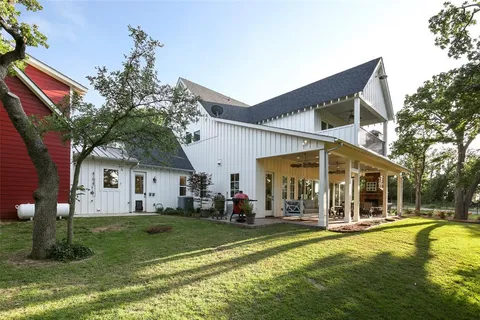a view of a house with a swimming pool