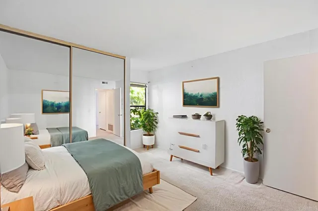 a bathroom with a shower curtain and a toilet