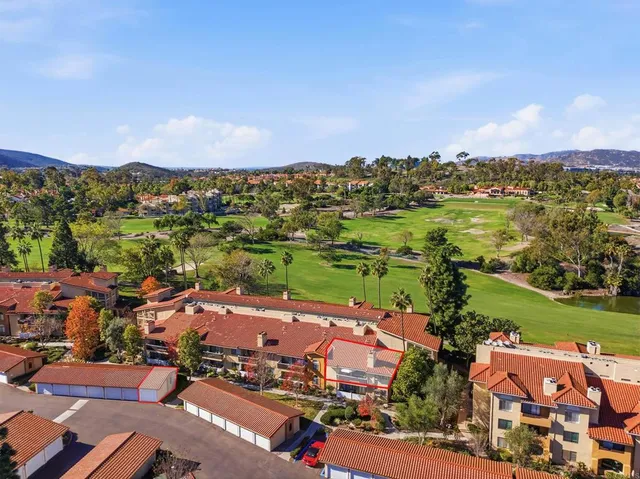 an aerial view of a city with lots of residential buildings