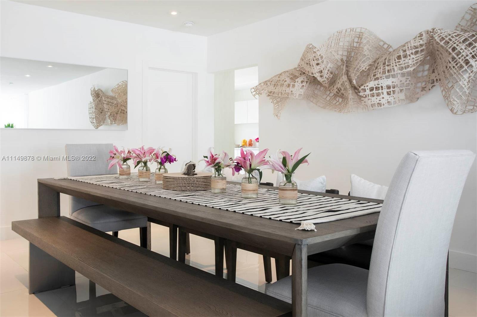 3020 Alton Road Miami Beach, FL 33140 - Photo 13 of 22 a view of a dining room with furniture