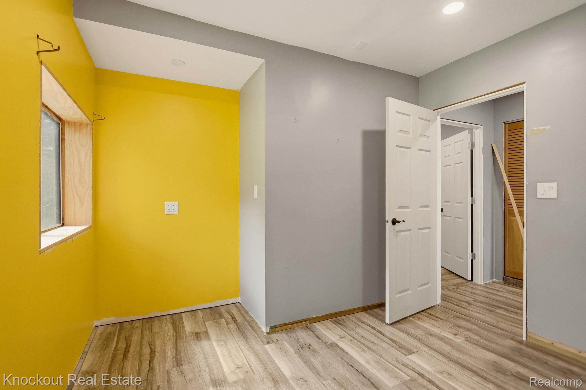 8811 Van Cleve Road Vassar, MI 48768 - Photo 24 of 39 Wood-finish flooring throughout, with a recessed ceiling light