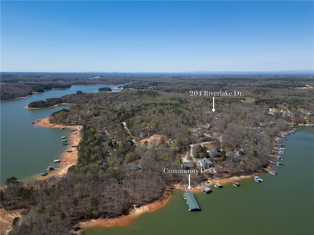 204 Riverlake Road Fair Play, SC 29643 - Photo 49 of 50 This elevated view captures the extensive lake and surrounding forested landscape.
