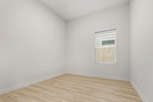 an empty room with a window