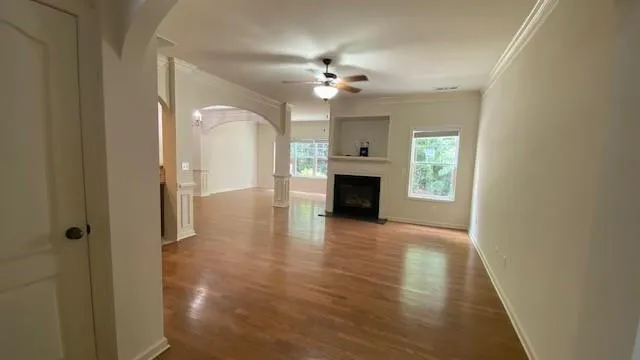 a kitchen with stainless steel appliances a refrigerator and a stove top oven