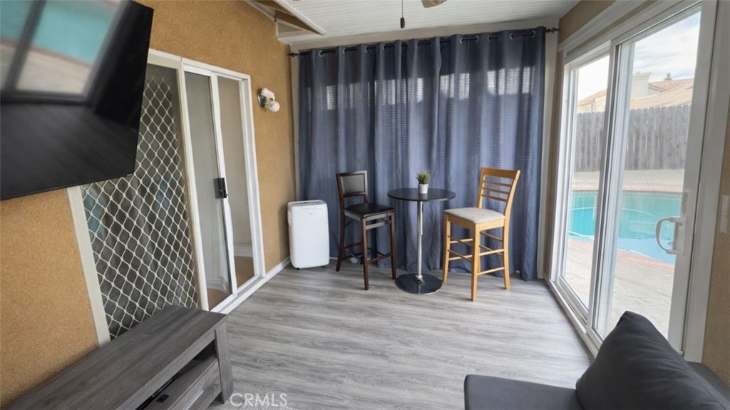 19972 Windwood Circle Riverside, CA 92508 - Photo 6 of 11 a view of a living room and hardwood floor