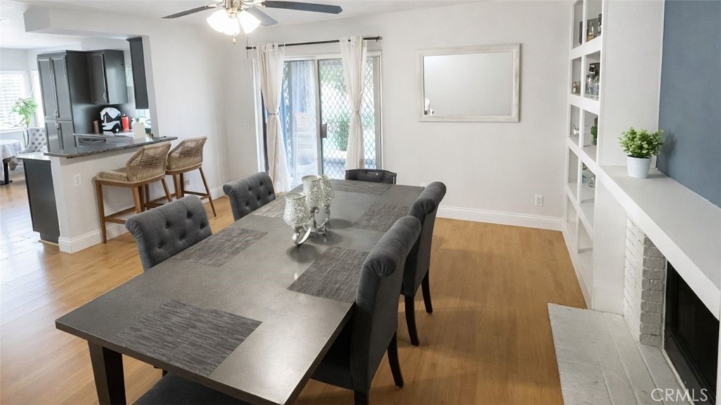 19972 Windwood Circle Riverside, CA 92508 - Photo 6 of 17 a view of a dining room with furniture and a chandelier