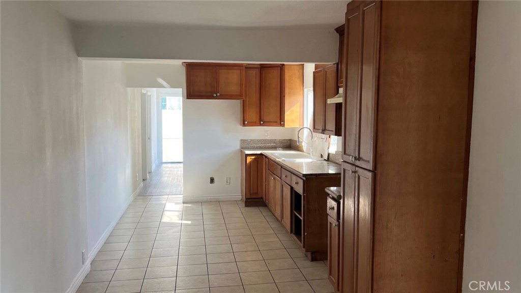 1582 Ricardo Street Los Angeles, CA 90033 - Photo 27 of 27 a bathroom with a sink a toilet and a mirror