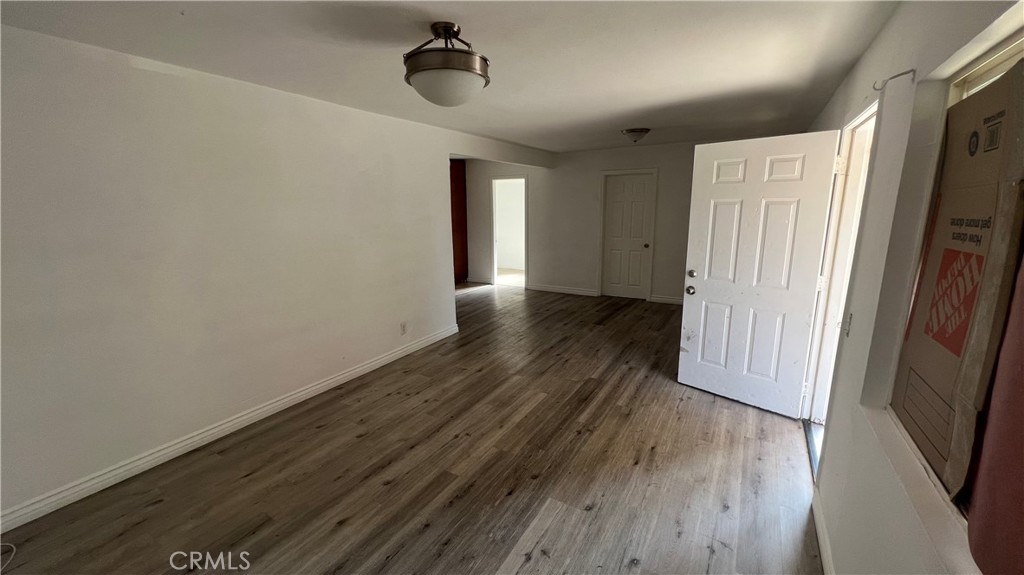 1582 Ricardo Street Los Angeles, CA 90033 - Photo 7 of 27 a view of livingroom with hardwood floor and window