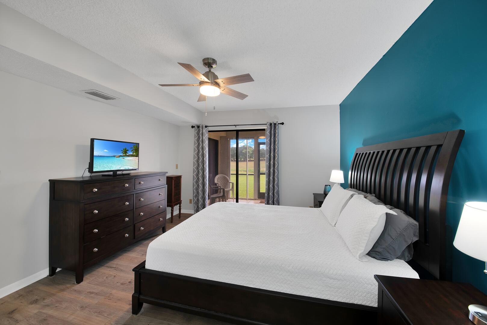 4708 Lucerne Lakes Boulevard East, Unit 104 Lake Worth, FL 33467 - Photo 16 of 28 a bedroom with a bed and a window