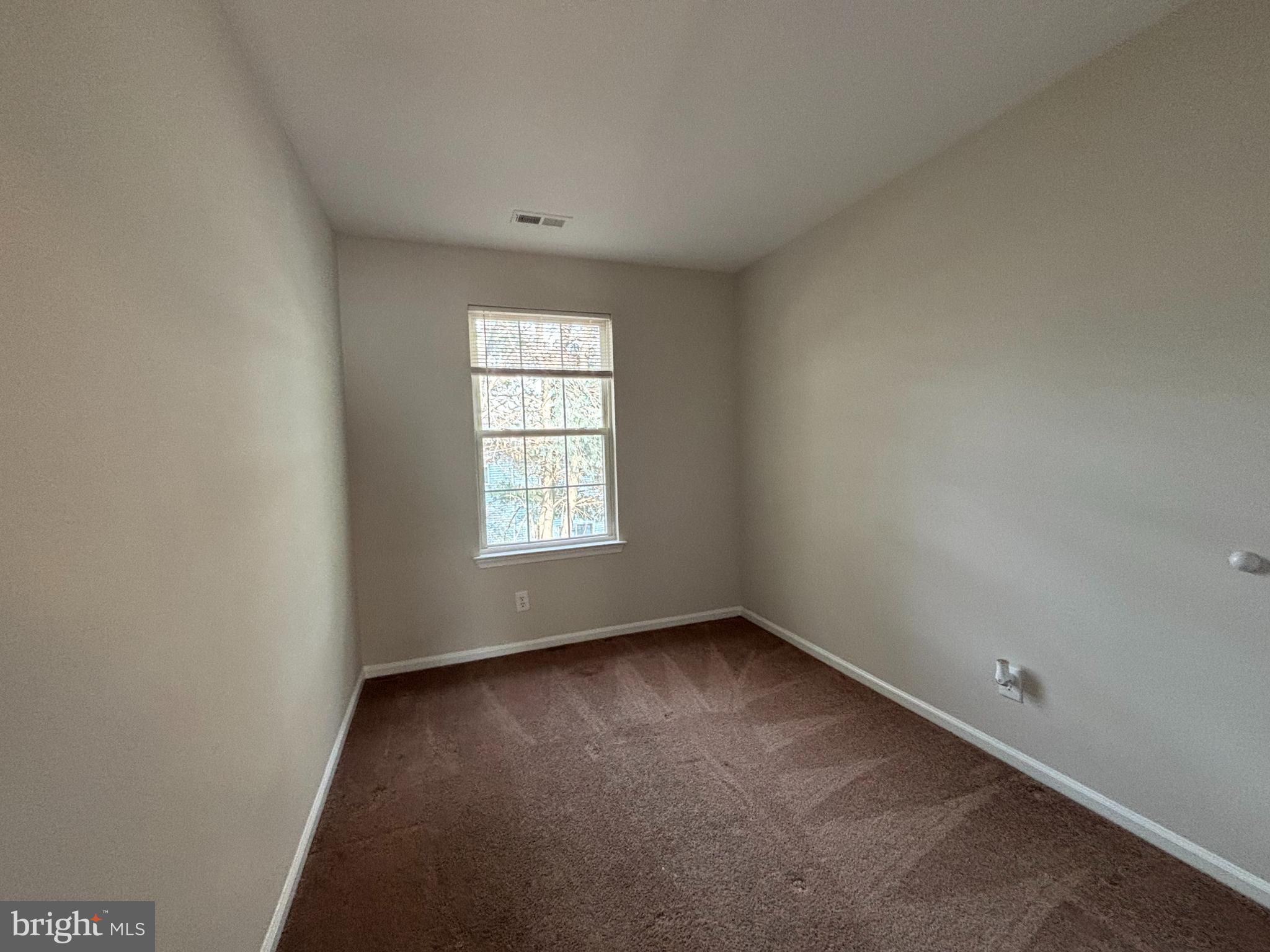 27 Gristmill Lane Pine Hill, NJ 08021 - Photo 13 of 19 an empty room with a window