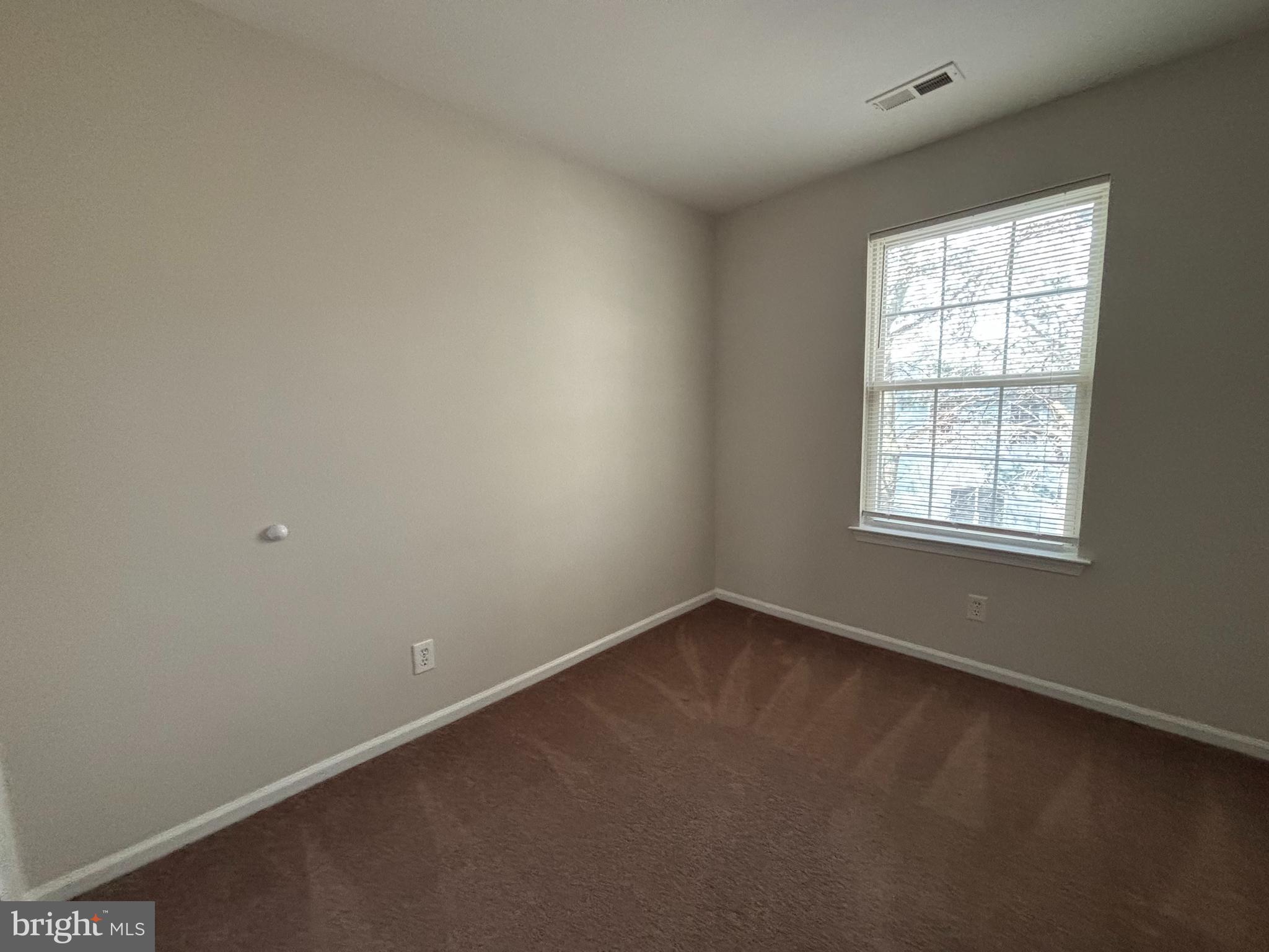 27 Gristmill Lane Pine Hill, NJ 08021 - Photo 17 of 19 an empty room with a window
