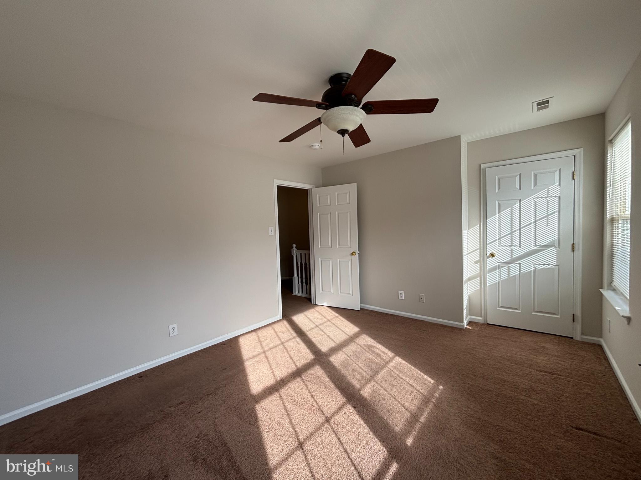 27 Gristmill Lane Pine Hill, NJ 08021 - Photo 10 of 19 a view of empty room with wooden floor