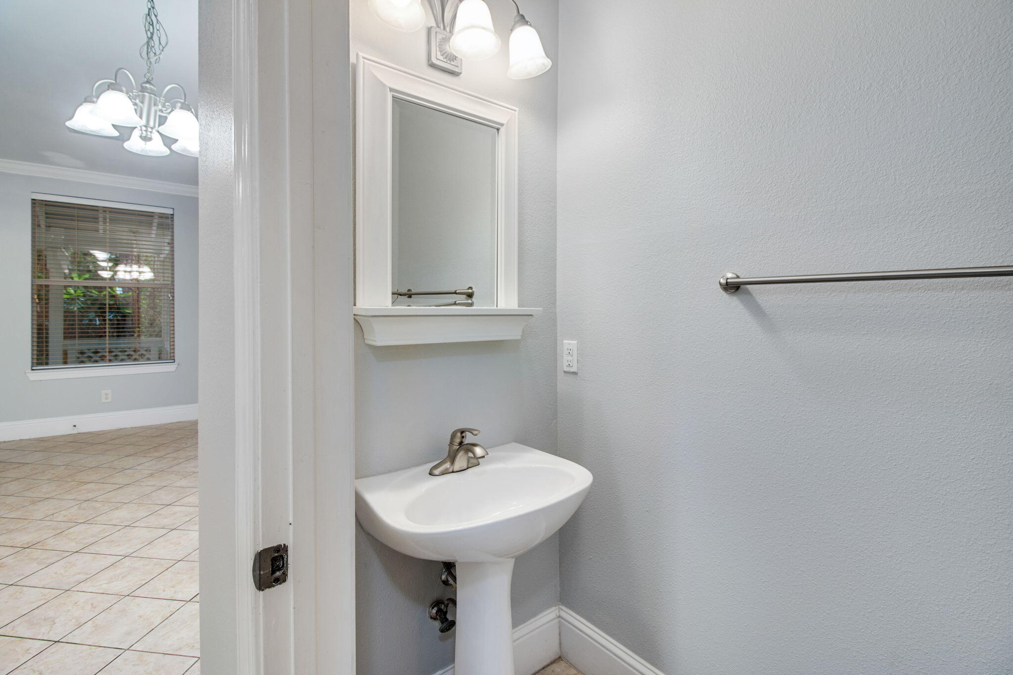 3 Talon Court Santa Rosa Beach, FL 32459 - Photo 17 of 20 a bathroom with a sink a mirror and vanity