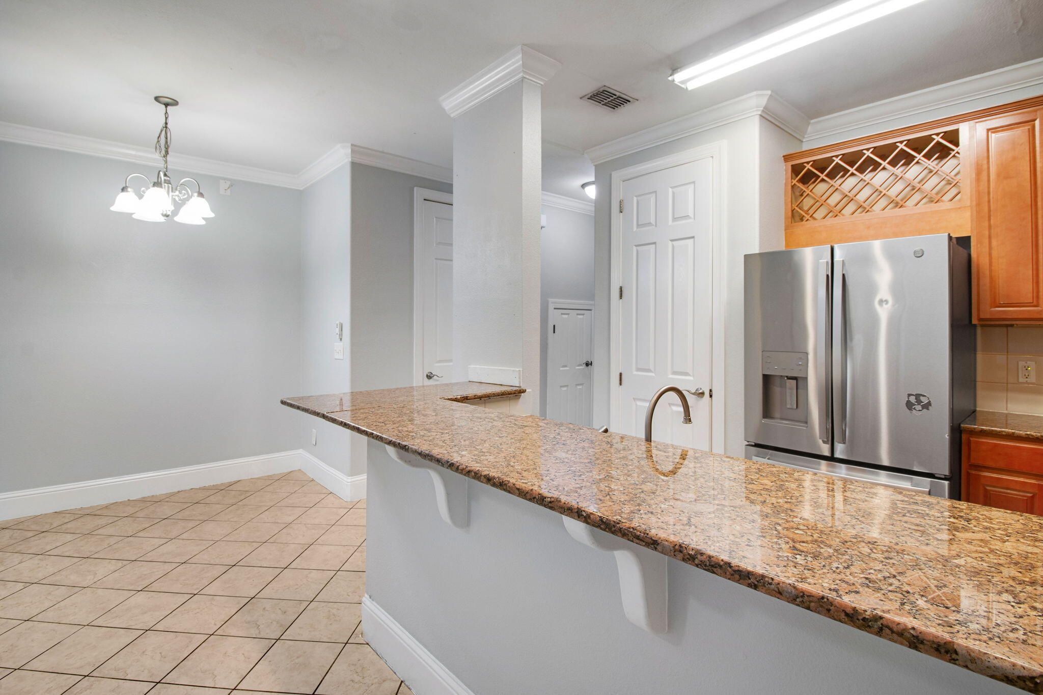 3 Talon Court Santa Rosa Beach, FL 32459 - Photo 4 of 20 a bathroom with a granite countertop sink and a mirror