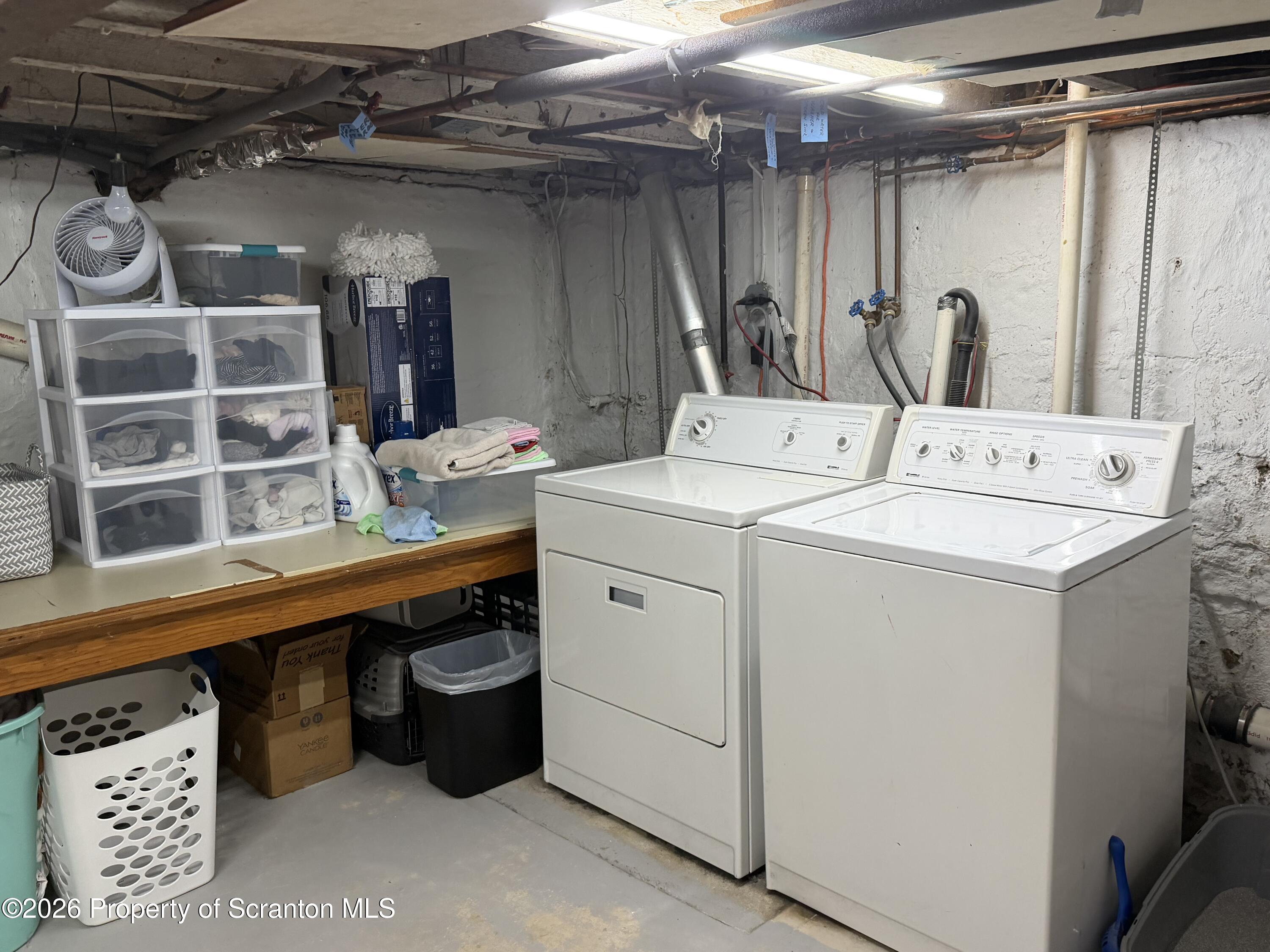 320 Haverly Street Throop, PA 18512 - Photo 23 of 27 a utility room with dryer and washer