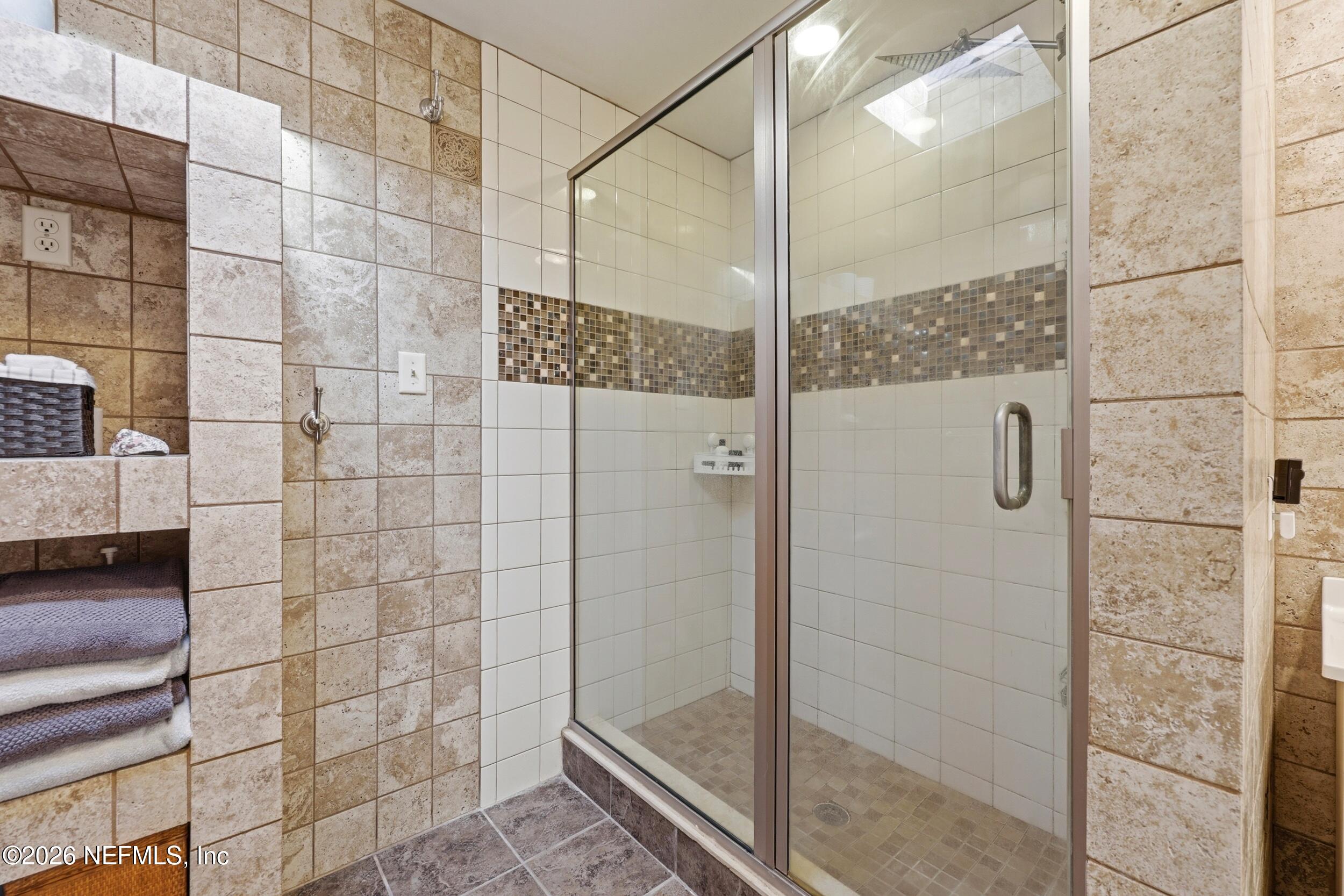 11627 Mandarin Terrace Road Jacksonville, FL 32223 - Photo 13 of 79 a bathroom with a shower