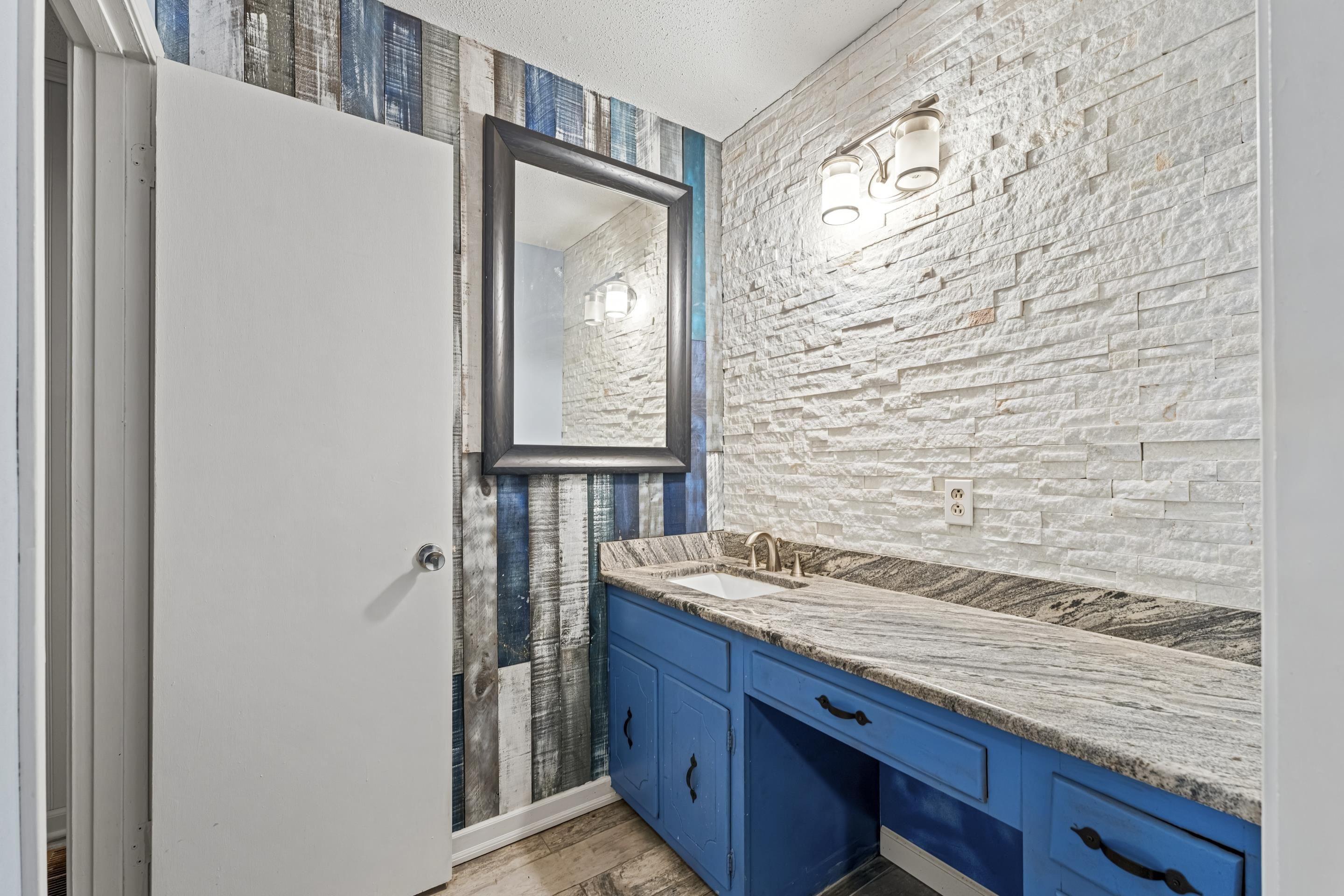 754 McWilliams Road Covington, TN 38019 - Photo 22 of 28 a view of kitchen with wooden floor