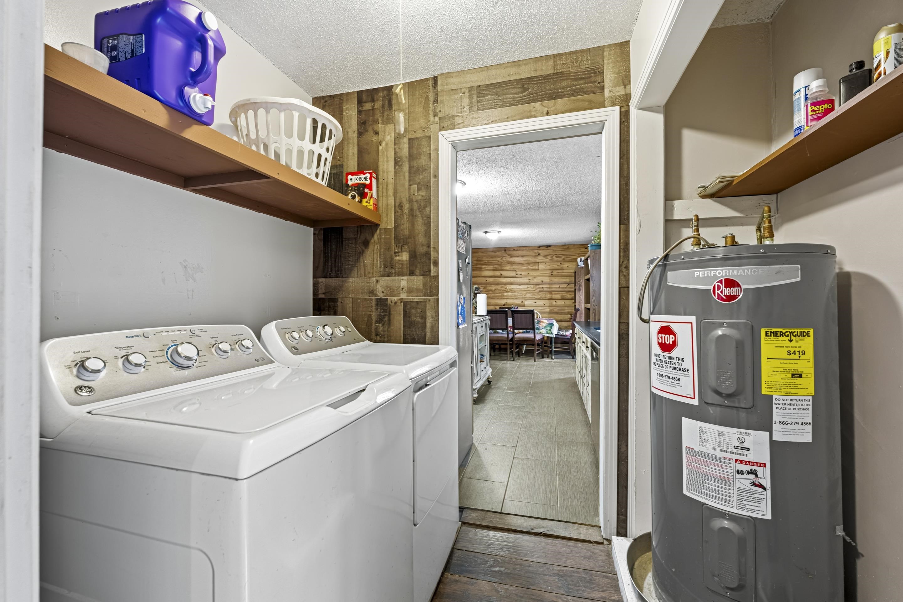 754 McWilliams Road Covington, TN 38019 - Photo 25 of 28 a utility room with dryer and washer