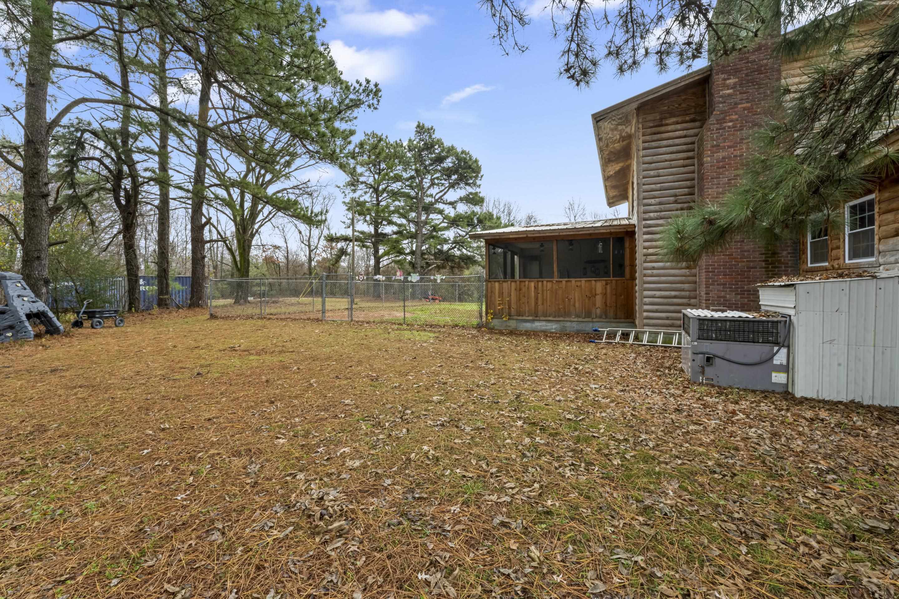 754 McWilliams Road Covington, TN 38019 - Photo 27 of 28 a view of a house with a yard