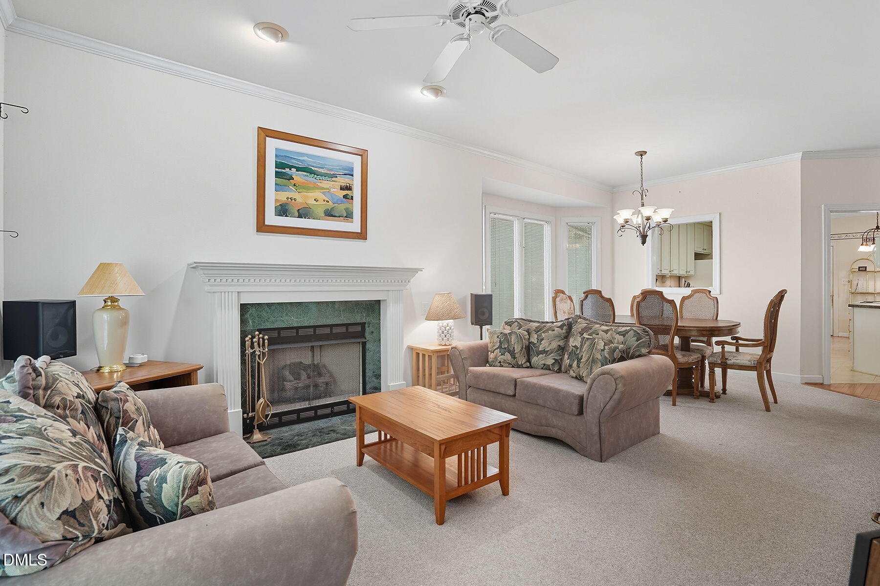2029 Castle Pines Drive Raleigh, NC 27604 - Photo 10 of 38 a living room with furniture and a fireplace