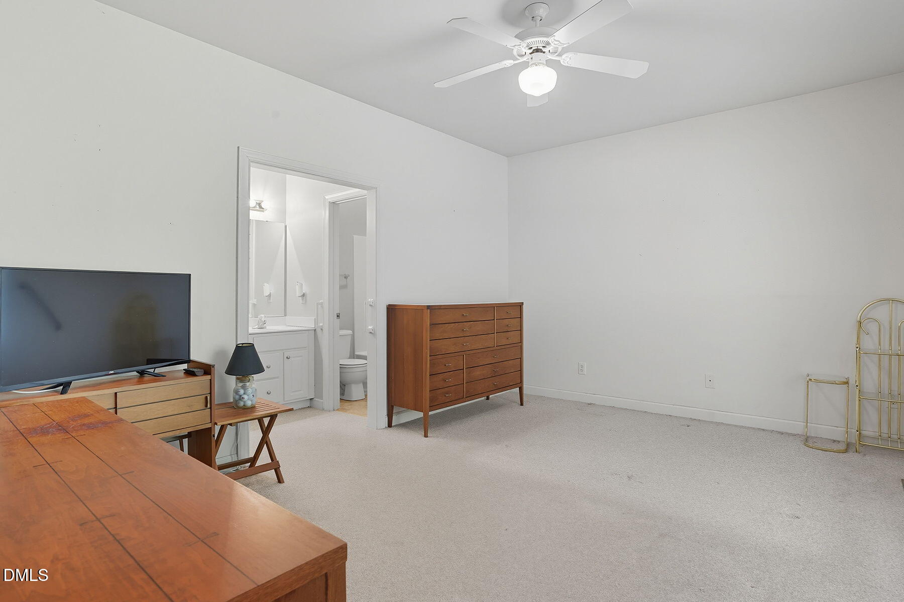 2029 Castle Pines Drive Raleigh, NC 27604 - Photo 23 of 38 a work room with furniture and a flat screen tv