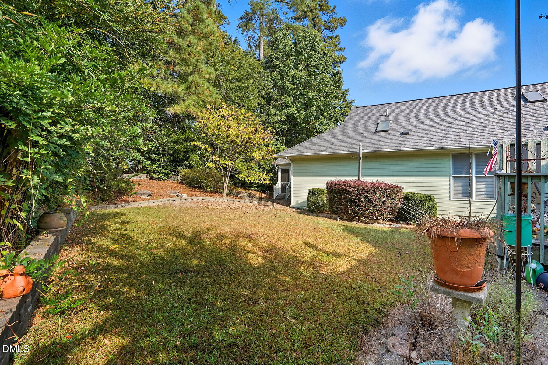 2029 Castle Pines Drive Raleigh, NC 27604 - Photo 30 of 38 a view of a house with backyard
