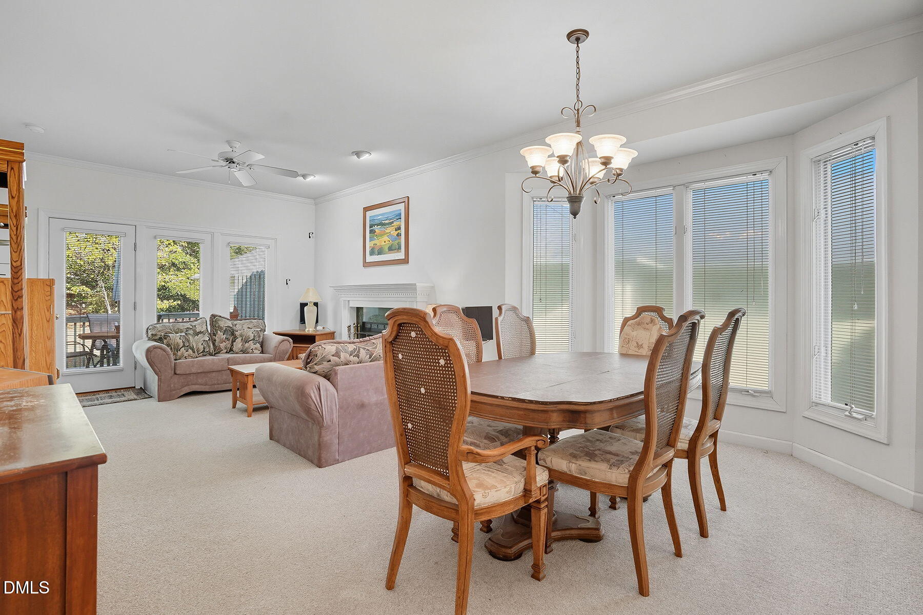 2029 Castle Pines Drive Raleigh, NC 27604 - Photo 7 of 38 a view of a dining room with furniture window and outside view