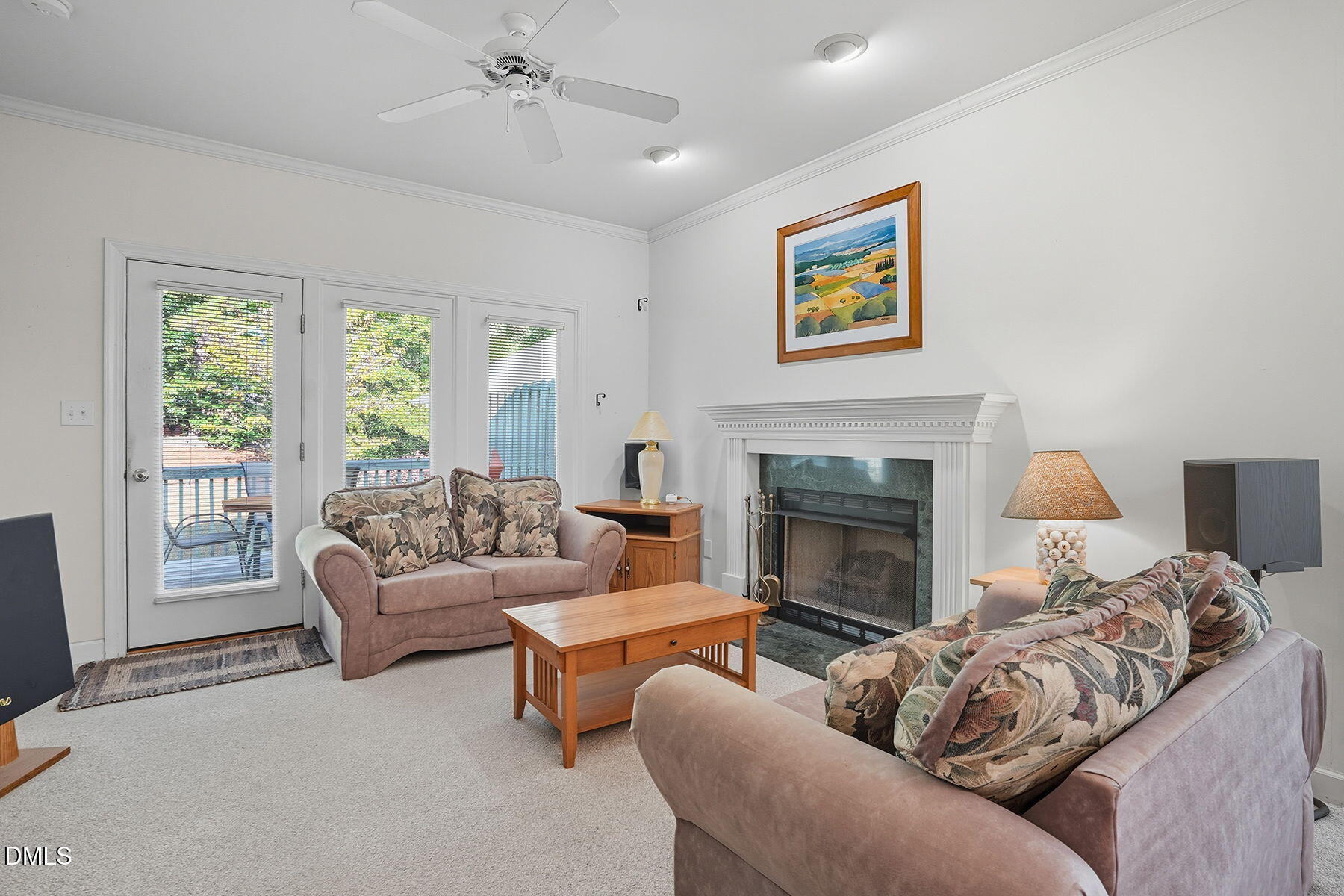 2029 Castle Pines Drive Raleigh, NC 27604 - Photo 8 of 38 a living room with furniture and a fireplace