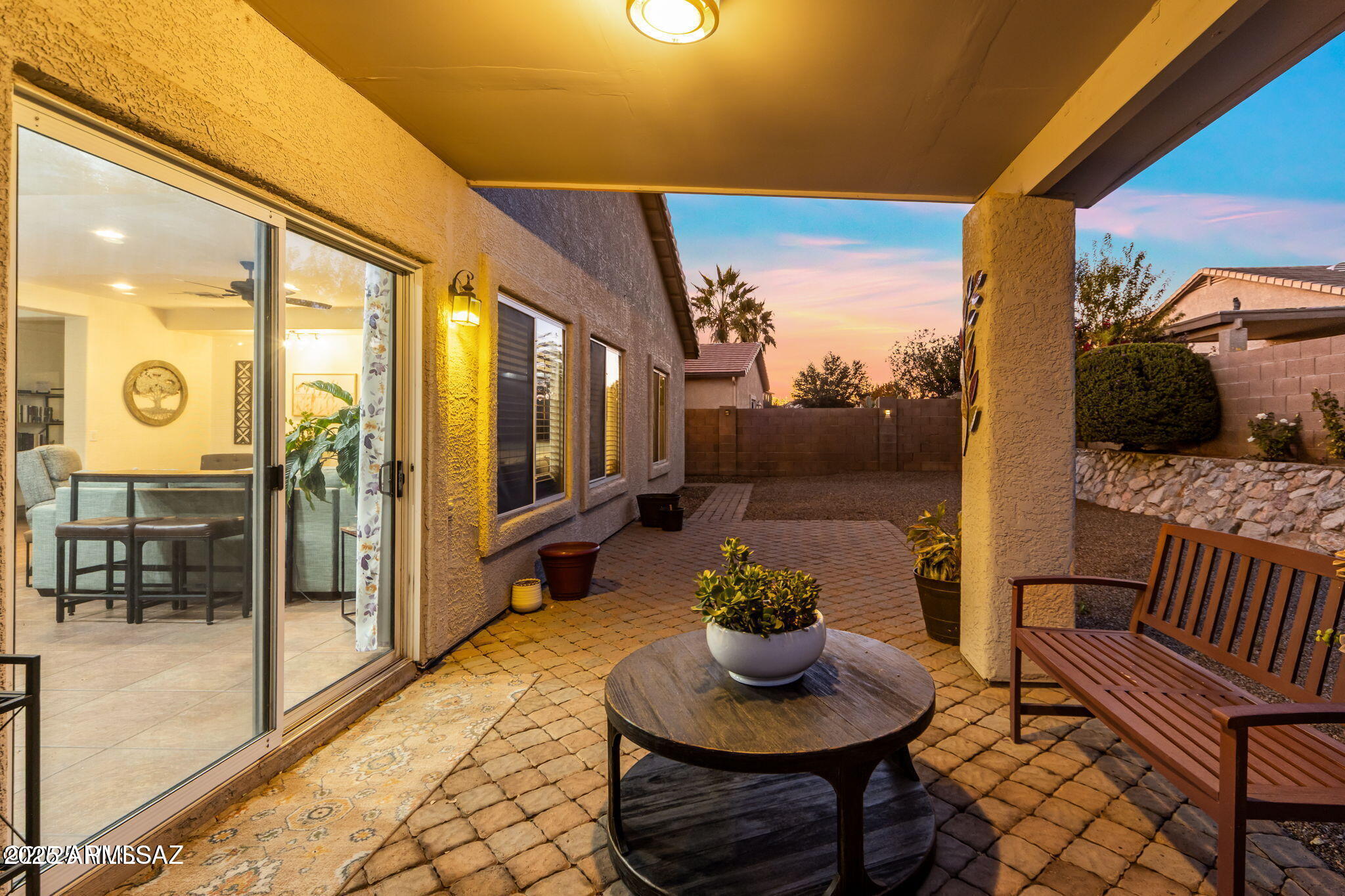 3635 East Secretariat Road Tucson, AZ 85739 - Photo 19 of 27 a lobby with furniture and a floor to ceiling window