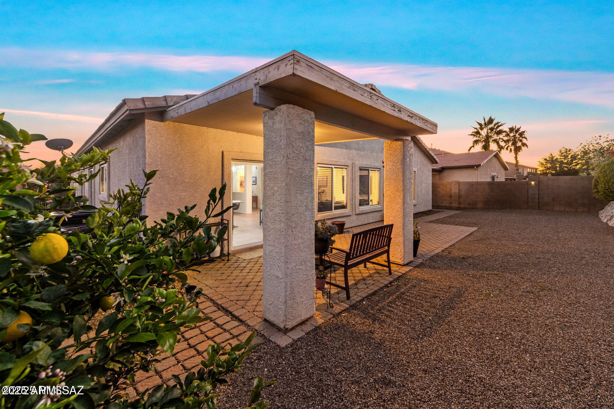 3635 East Secretariat Road Tucson, AZ 85739 - Photo 22 of 27 a view of a house with a backyard