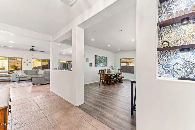 a view of living room filled with furniture and couch
