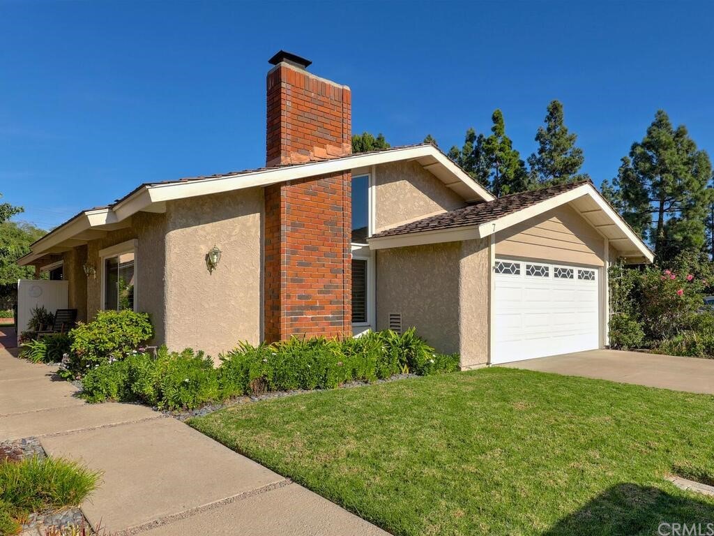7 Sunridge Irvine, CA 92604 - Photo 1 of 66 front view of house with a yard