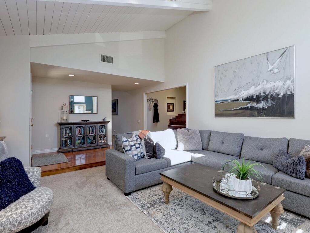 7 Sunridge Irvine, CA 92604 - Photo 10 of 66 a living room with furniture and view of kitchen